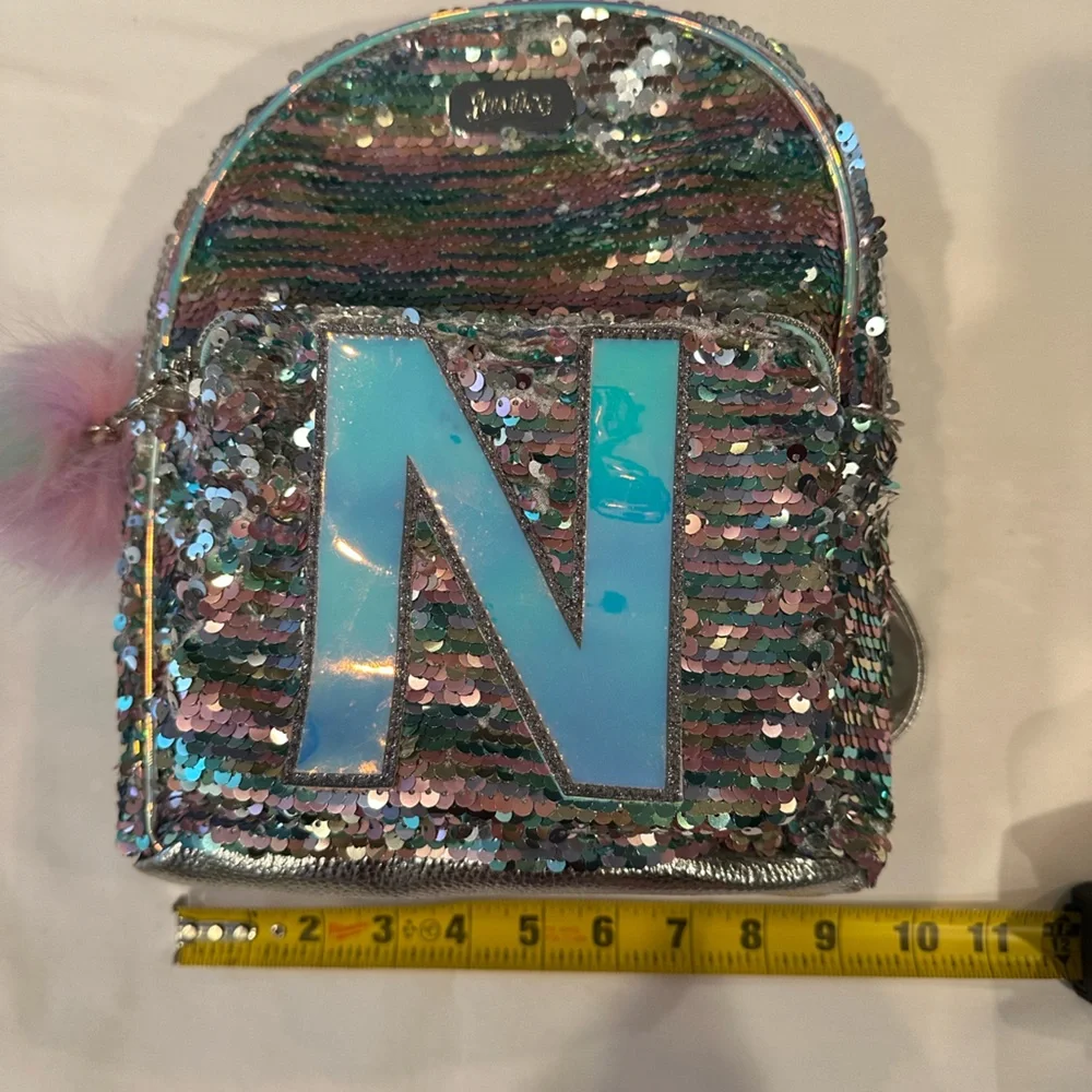 Justice Small Silver Sequin Backpack with Pom Pom Initial (Letter N)